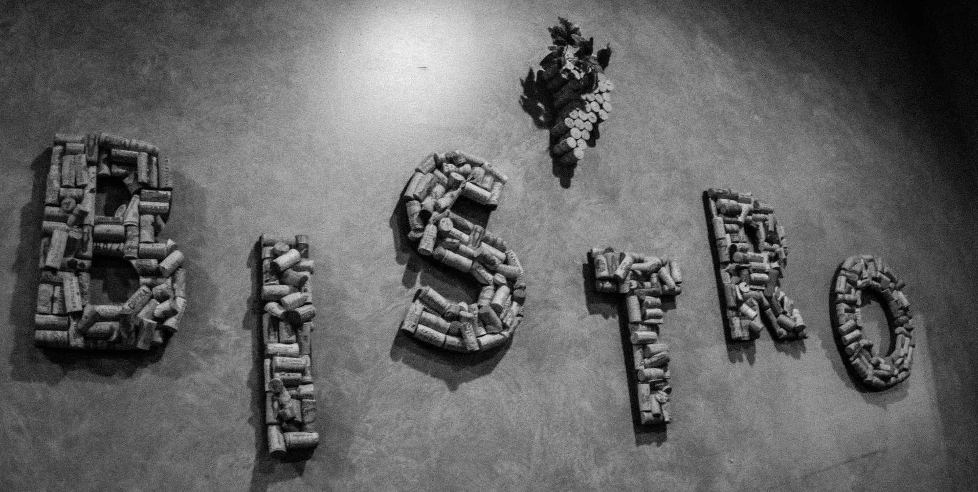 The BISTRO sign spelled in wine corks in the dining room