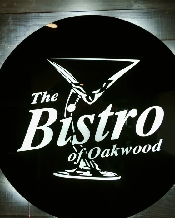 The lit Bistro of Oakwood sign
